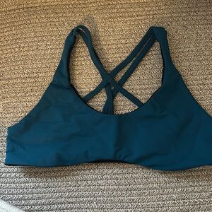 Tera Kaia teal and black sports bra